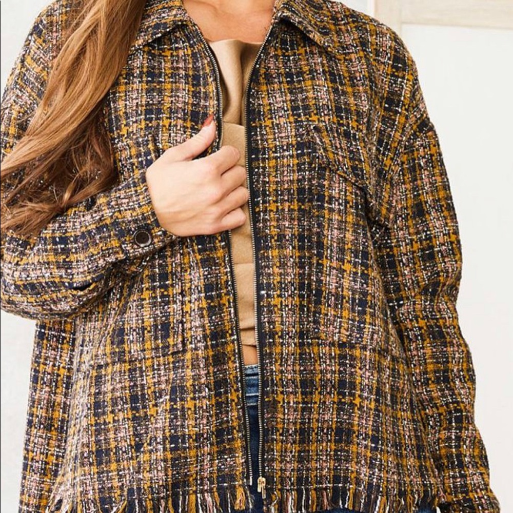 Only worn once. Beautiful tweed jacket.